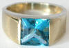 2.5 carat Square Cut Blue Topaz Tank Ring in 14k yellow gold