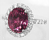 Pink Tourmaline and Diamond Halo Ring in 14k white gold