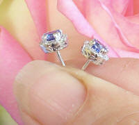Natural blue sapphire stud earrings with a diamond halo in 14k white gold for sale