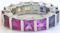 Princess cut natural rainbow sapphire eternity ring in gold