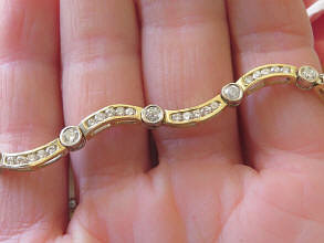 3 carat Bezel Set Women's Diamond Wave Bracelet in 14k white and yellow gold
