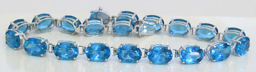 Oval Blue Topaz Bracelet in 14k white gold