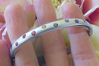 Burnished Natural Round Rainbow Sapphire Bangle Bracelet in solid 14k white gold with Satin Finishing for sale