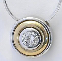 Bezel Set Diamond Solitaire Necklace in 14k white and yellow gold
