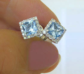Natural Princess Cut Aquamarine Earrings with a a Diamond Halo in 14k white gold