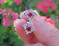 Natural Princess Ruby Earrings with a Diamond Halo in 14k white gold