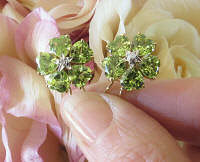 Natural Peridot Flower Earrings with Heart Cut Peridot Gemstones in real 14k yellow gold for sale