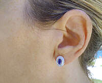 Bezel Set Oval Blue Sapphire Earrings with Diamond Halo in 14k white gold