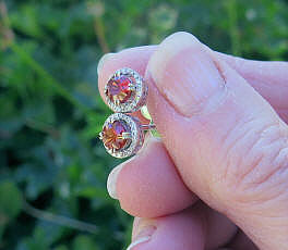 Natural round red orange sapphire stud earrings in 14 white gold