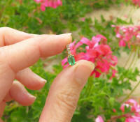 Real Oval Emerald and Diamond Pendant in 14k yellow gold