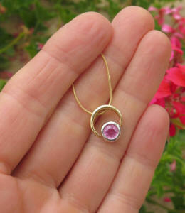 Natural Pink Sapphire Pendant in 14k white and yellow gold for sale