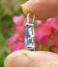 Unique Custom Cut Blue Topaz and Diamond Pendant in 14k white gold