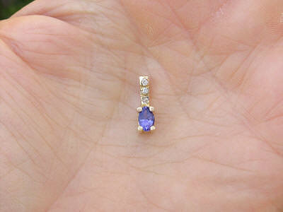 Tanzanite pendant in 14k yellow gold