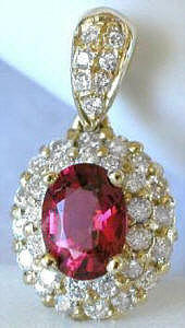 Rubellite Tourmaline and Diamond Halo Pendant in 14k yellow gold