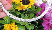 Italian woven mesh white gold necklace with box closure and safety catch, 18 inches.