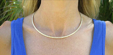 Real 14k Yellow Gold Omega Necklace for sale. 17 inches
