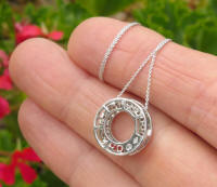 Genuine Rainbow Sapphire Eternity Pendant in white gold