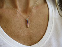 Stylish natural rainbow sapphire pendant in 14k white gold, perfect for any occasion.