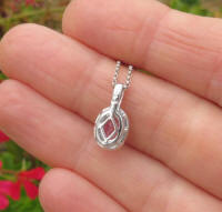 Oval Pink Sapphire Pendant in 14k white gold