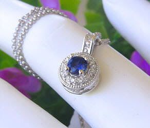 Ceylon Round Cut Natural Blue Sapphire Pendant Necklace with a Diamond Halo set in 14k white gold