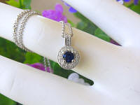 Round Natural Sapphire Pendant Necklace with a Diamond Halo set in 14k white gold for sale