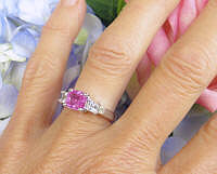 Natural Cushion Cut Pink Sapphire and Princess Cut White Sapphire Three Stone Ring  in white gold for sale
