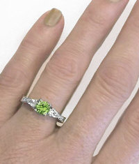 round peridot and pear white sapphire ring in 14k white gold