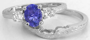 Natural Oval Tanzanite and Round Diamond Engagement Ring Set in 14k white gold