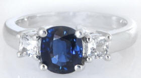 Traditional Natural Dark Blue Sapphire and Princess White Sapphire Ring in 14k white gold for sale