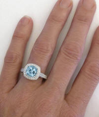 Cushion Aquamarine and Diamond Halo Rings in 14k white gold