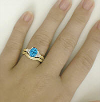 Blue Topaz Wedding Rings with Engraving in 14k yellow gold