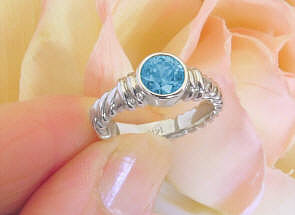 Bezel Set Round Blue Zircon Ring in 14k white gold for sale