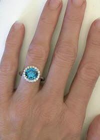Exceptional Round Blue Zircon and Diamond Halo Rings in 14k