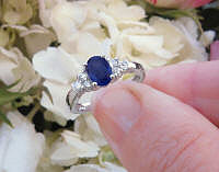 Natural Oval Cut Blue Sapphire Ring with Real Diamonds in 14k white gold for sale