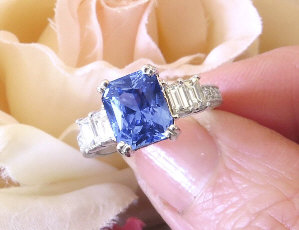 3 carat Radiant Cut Natural Sapphire and Baguette Diamond Ring in 18k white gold for sale