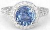 Round Blue Sapphire and Diamond Halo Ring in 14k White Gold