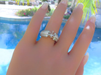 A stunning 1 carat Baguette and Round Diamond Semi Mount Ring in 18k white gold.