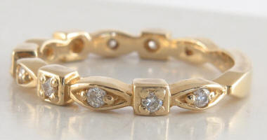 Stackable diamond band ring with marquise and square stations in 14k yellow gold for sale