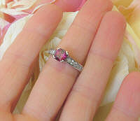 Cushion cut rhodolite garnet band ring in 14k white gold