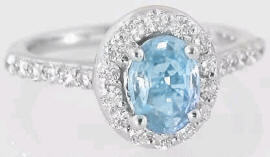 Aquamarine and Diamond Halo Ring in 14k White Gold