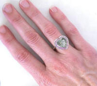 Heart Shape Green Amethyst Rings in 14k white gold on the hand