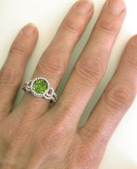 Peridot Engagement Ring and Wedding Band on the hand