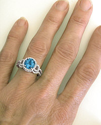 Swiss Blue Topaz Engagement Ring and Wedding Band on the hand