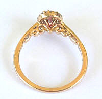 Ornate swirl pattern of  Pink Sapphire Ring in 14k Rose Gold