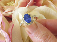 Natural Untreated Oval Ceylon Blue Sapphire and Diamond Halo Engagement Ring in solid 14k yellow gold for sale