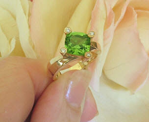 14k yellow gold Natural Peridot Fashion Ring with diamond set prongs