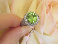Real 9x11mm Oval Peridot and Round Diamond Ring 14k white gold