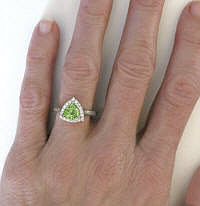 Trillion Cut Peridot Ring with Diamond Halo in 14k white gold