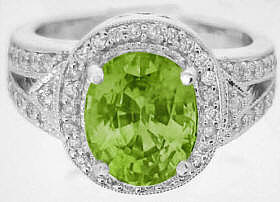 3.53 carat Oval Peridot and Diamond Ring in 14k white gold