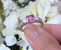 Ornate Natural Princess Cut Pink Sapphire Wedding Ring with Real Princess Diamonds  in a detailed 14k white gold band for sale